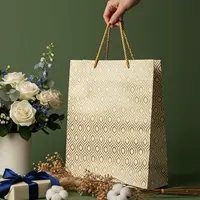 PrettyKrafts leaf-printed paper gift bags, pack of 5, 38 x 28 x 9 cm